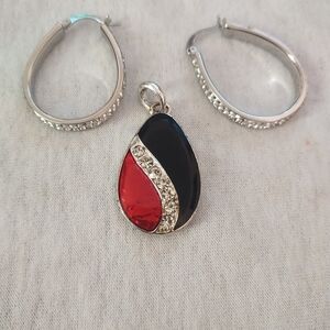 Silver toned reversible pendant with matching Earrings